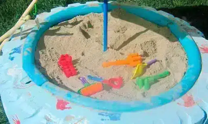 20 Tire Recycling Ideas: Sandbox made from recycled tires