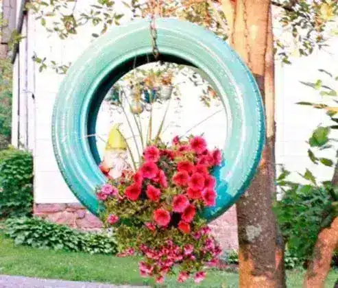 20 tire recycling ideas: Hanging planter made from recycled tires